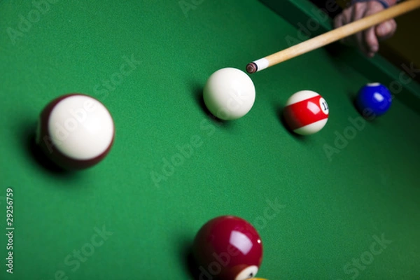 Fototapeta Pool game balls against a green