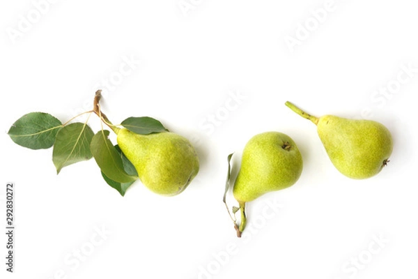 Obraz Green pears with leaves isolated on white background, top view
