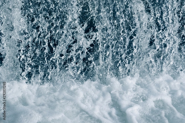 Fototapeta Blue and turquoise water with irregular wave structure