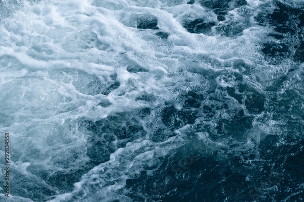 Fototapeta Blue and turquoise water with irregular wave structure