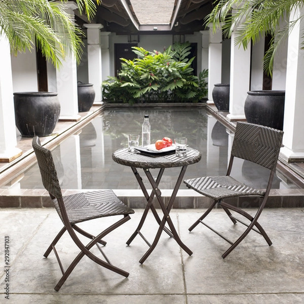 Obraz The net table and chairs in the backyard.