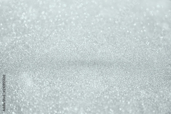 Obraz Silver white glittering Christmas lights. Blurred abstract background