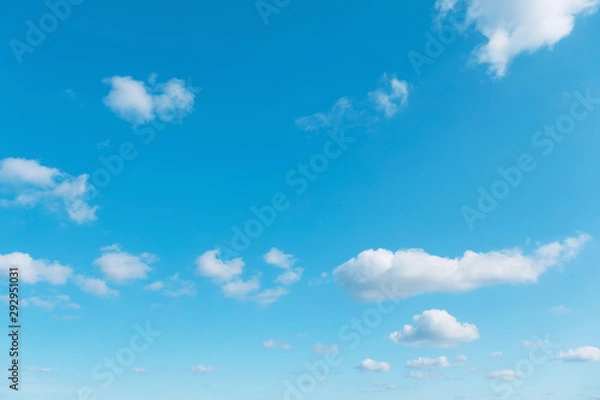 Fototapeta Blue sky background with cumulus clouds