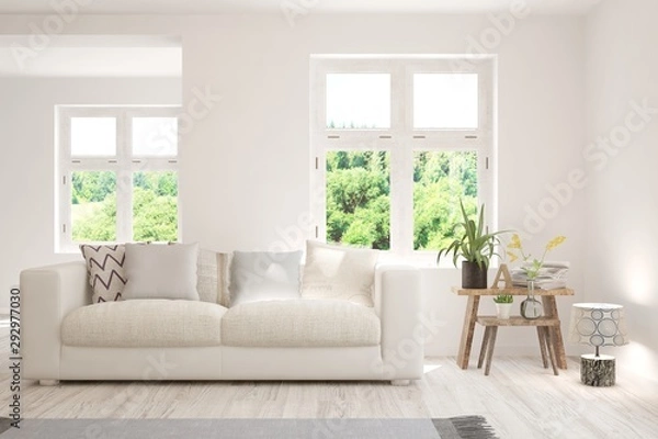 Fototapeta Stylish room in white color with sofa and summer landscape in window. Scandinavian interior design. 3D illustration