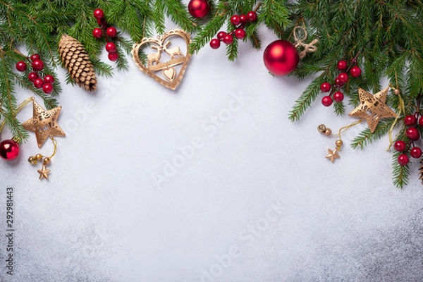 Fototapeta Christmas background with fir tree, red and gold gifts. Top view Copy space