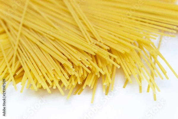 Fototapeta fresh spaghetti isolated over white background. Cooked, fresh spaghetti