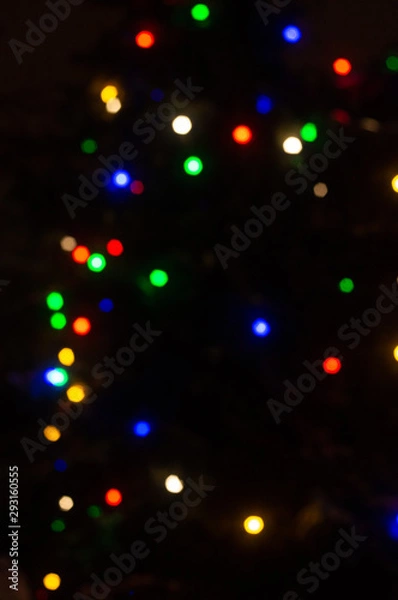 Fototapeta Christmas multi-colored lights on a black background, winter, bokeh, background