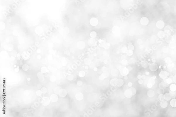 Fototapeta Abstract background with White bokeh on gray background. christmas blurred beautiful shiny Christmas lights.