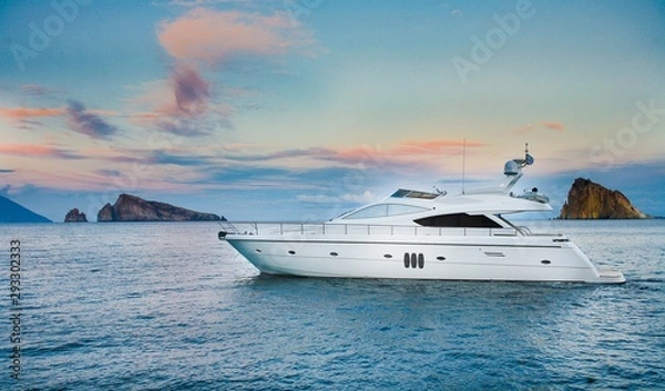 Fototapeta yacht in the sea at sunset