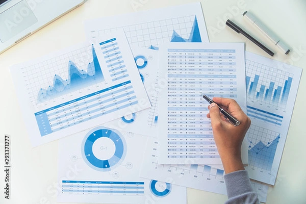 Fototapeta businessman working data document graph chart report marketing research development  planning management strategy analysis financial accounting. Business  office concept.