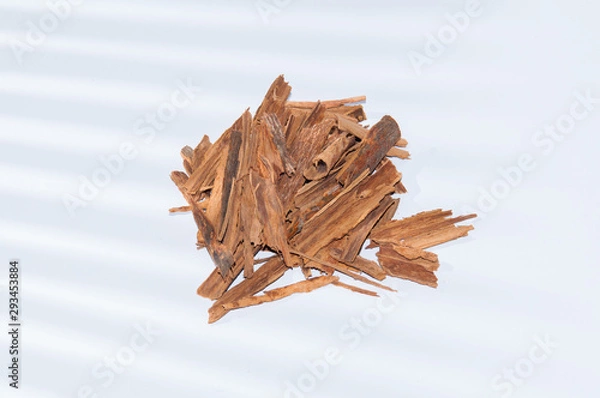 Fototapeta Ceylon cinnamon on white background