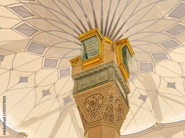 Obraz Medina, Saudi Arabia - March 22, 2018 : Exterior view of umbrella tower in Nabawi Mosque (Prophet Mosque) building in Medina. Selective focus