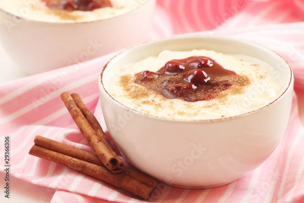Fototapeta Rice Pudding with Cherry Sauce