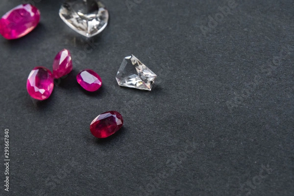 Fototapeta Collection of Red ruby and topaz, Precious stones for jewellery on black background