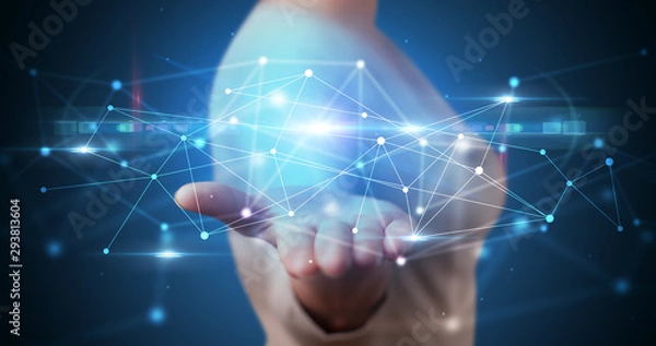 Obraz Handsome person holding hologram screen displaying modern cloud based web system technology