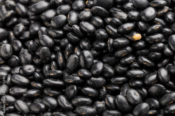 Obraz Black beans on a white background
