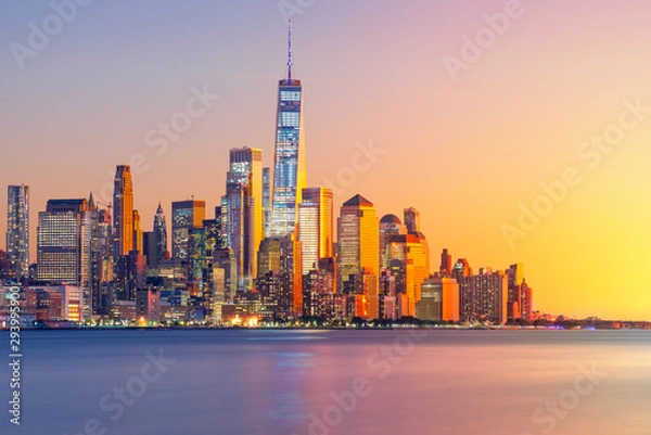 Fototapeta a magnificent view of Lower Manhattan and the financial district at sunset, New York City