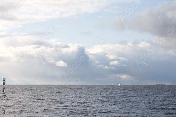 Fototapeta Sea landscape with blue waves on a sunny day