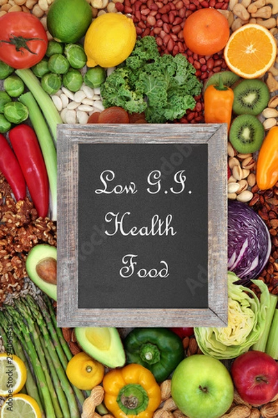 Obraz Low GI health food for diabetics also high in antioxidants, anthocyanins, vitamins, minerals, smart carbs & omega 3 fatty acids. Below 55 on the GI index. Top view with blackboard title.