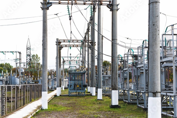 Fototapeta Substation with high voltage equipment in open space