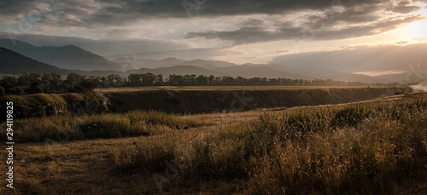 Fototapeta sunset over the field in armenia