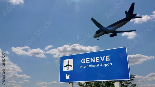Fototapeta Plane landing in Geneve with signboard