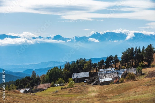 Fototapeta Cloudy autumn day over highest village on Balkans and Bulgaria - Ortsevo in Rhodope mountain.