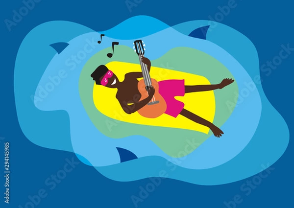 Fototapeta A musician swims on a mattress and plays the guitar