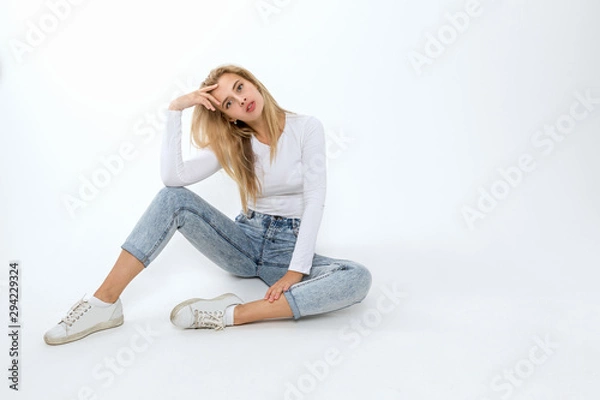 Obraz Young blonde female posing on a white background