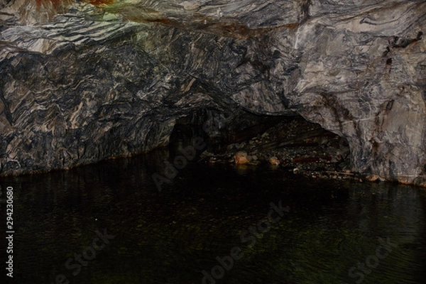 Obraz Underground Grotto Panorama.Types of a former underground marble quarry flooded with water. The massive arches of the grotto and the texture of natural marble are visible. Russia, Karelia, Ruskeala