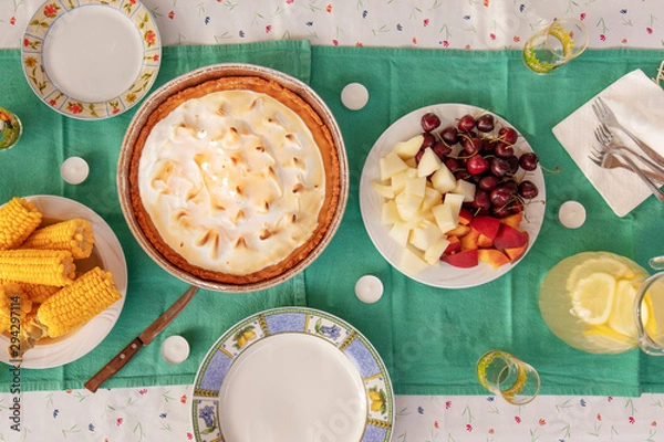Fototapeta High angle view of table with cake and fresh fruits