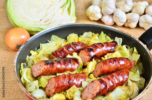 Obraz Kielbasa with white cabbage