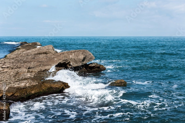 Fototapeta Waves breaking on coastal cliffs big splashes