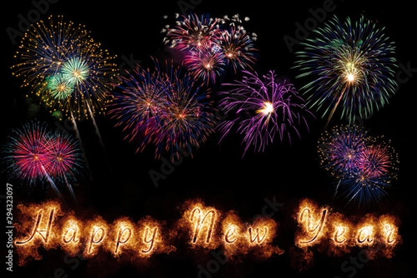 Fototapeta Happy New Year letters with sparkle, fire and fireworks on black background