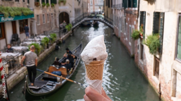 Fototapeta an ice cream in the background gondola in venice