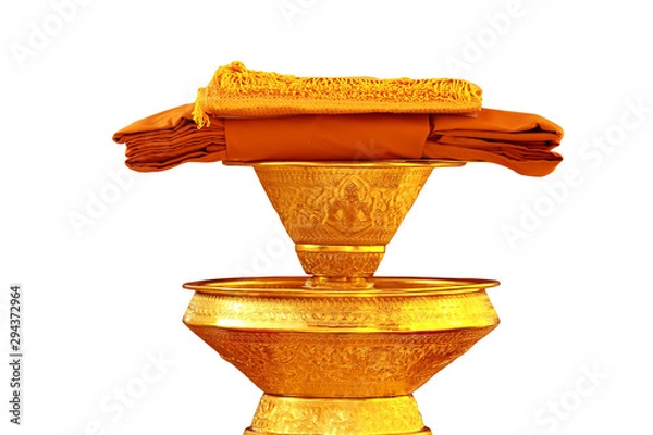 Obraz Kathin fabric, Kathin ceremony, Buddhist monk dresses in a carved tradition pearl tray with clipping path on white background
