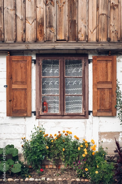 Fototapeta old window with flowers