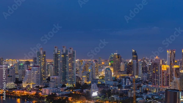 Fototapeta Panorama of landscape with sunset over the building and blue sky at bangkok ,Thailand. View of the tall building in capital with twilight