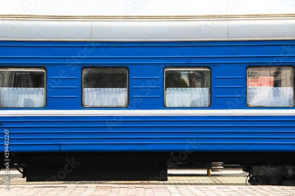 Obraz Train's wagon on railway station side view