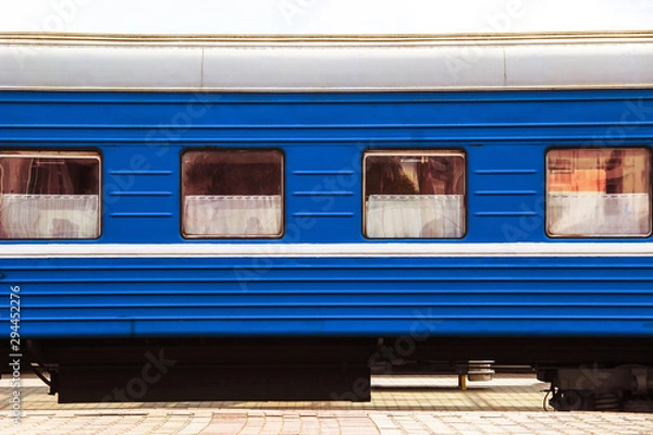 Obraz Train's wagon on railway station side view