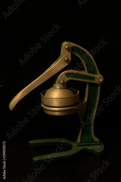Obraz Old metal manual orange squeezer