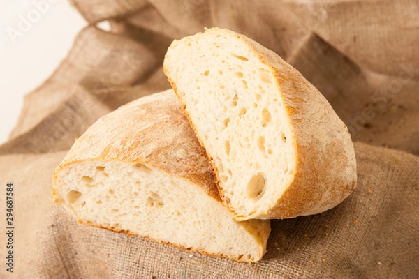 Obraz white bread on burlap background