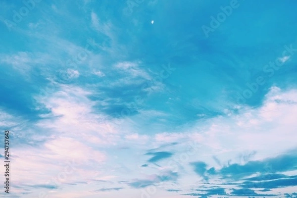Obraz blue sky with clouds reflected in water