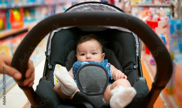 Fototapeta to shop in baby stores with stroller. baby in stroller