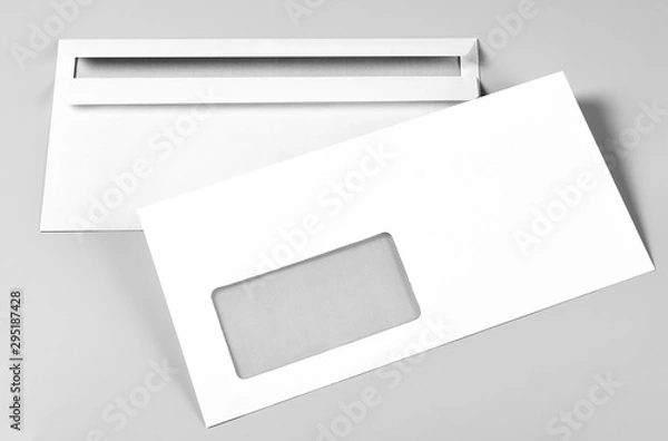 Obraz Two Blank Envelopes over Grey Background