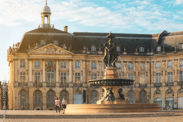 Fototapeta Three Graces fountain in Place de la Bourse. This square is one of the most representative works of classical French architecture.
