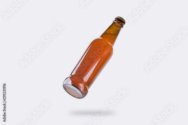 Obraz Botella de cerveza flotando