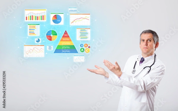 Obraz Middle aged nutritionist with nutrient intake concept