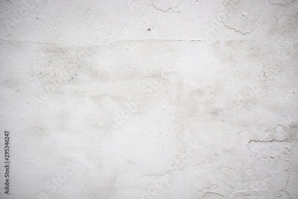 Fototapeta Light surface of concrete. The surface is uneven, with traces of construction tools. The color is light gray. Horizontal orientation.