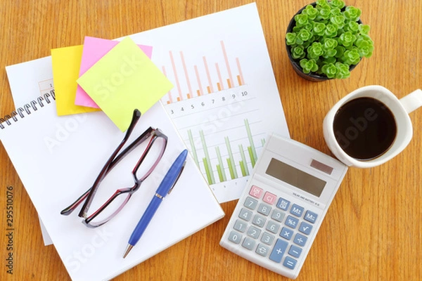 Obraz graph paper and note book in business concept